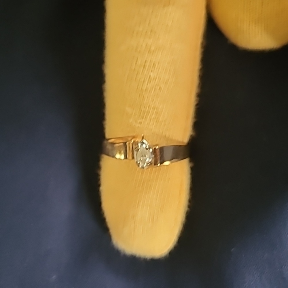COPY - 10k gold size 6 ring with marquise diamond that measures 0.5 x 0.3 cm